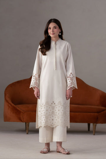 Model wearing Akbar Aslam Ecru long shirt & trousers