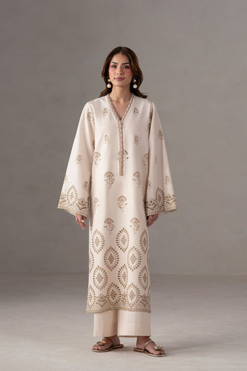 Model wearing Akbar Aslam Lunel long shirt & trousers