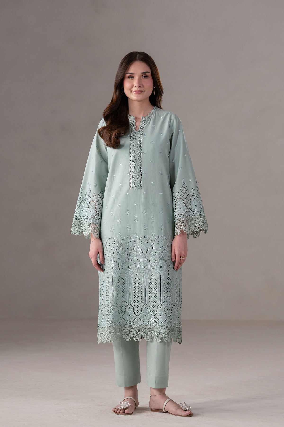 Model wearing Akbar Aslam Mireve long shirt & trousers