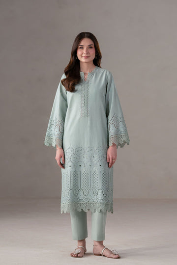 Model wearing Akbar Aslam Mireve long shirt & trousers