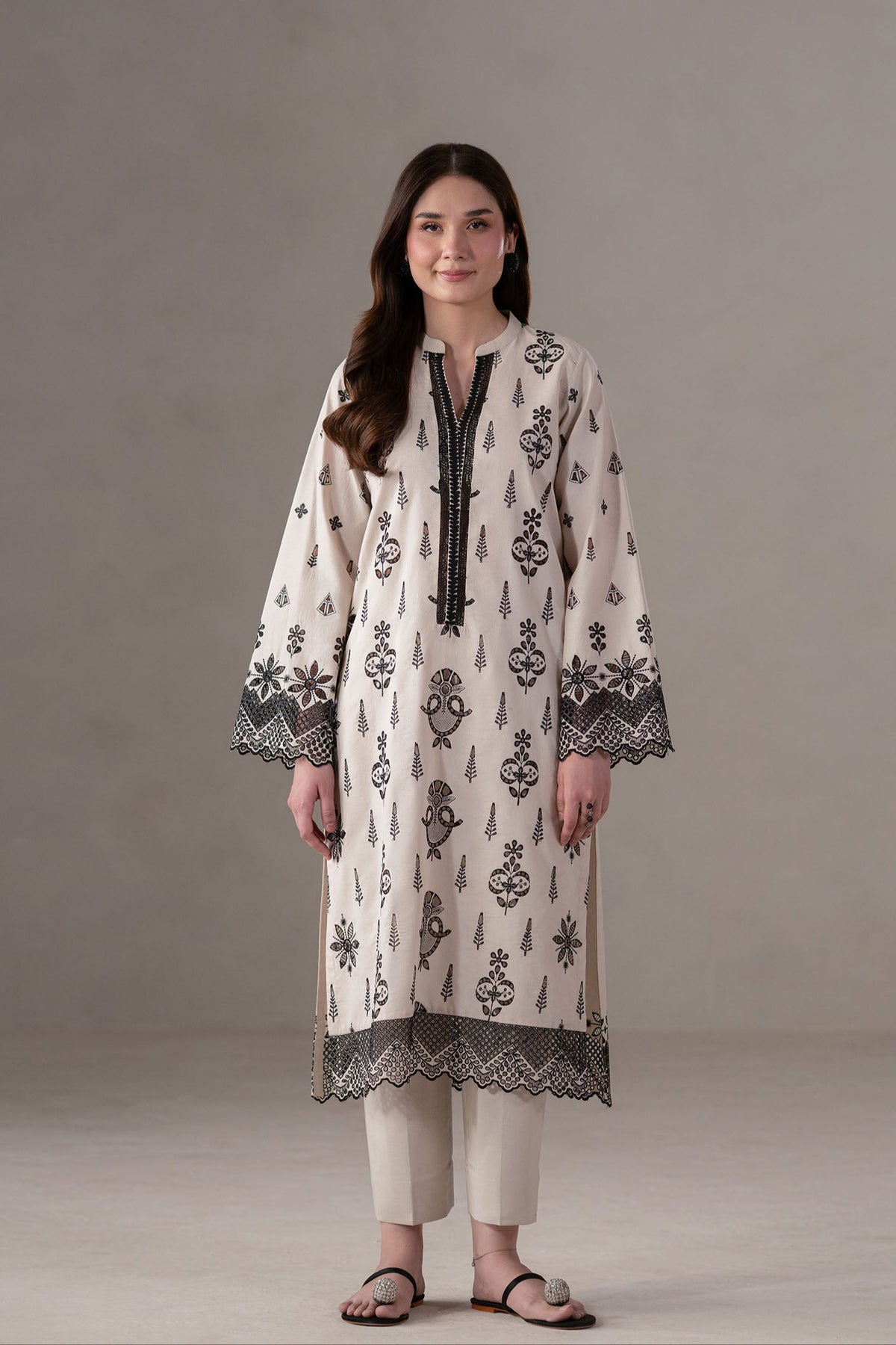 Model wearing Akbar Aslam Slate long shirt & trousers