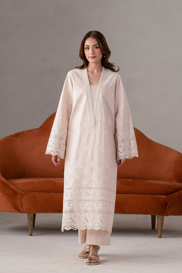 Model wearing Akbar Aslam Zira long shirt & trousers
