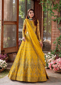 Model wearing Akbar Aslam SHEHERNAZ yellow blouse with dupatta