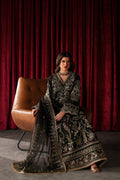 Emaan Adeel Luce S0515 embroidered raw silk suit in black — seated view