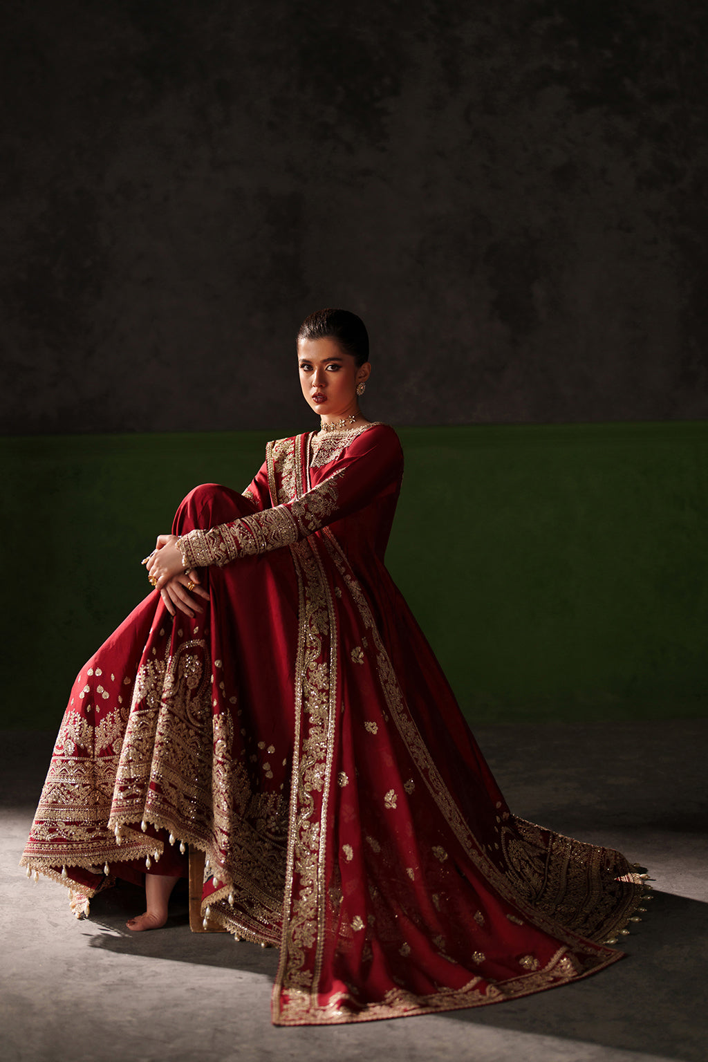 Emaan Adeel Onyx Muse S0513 embroidered raw silk dress in deep red — seated view