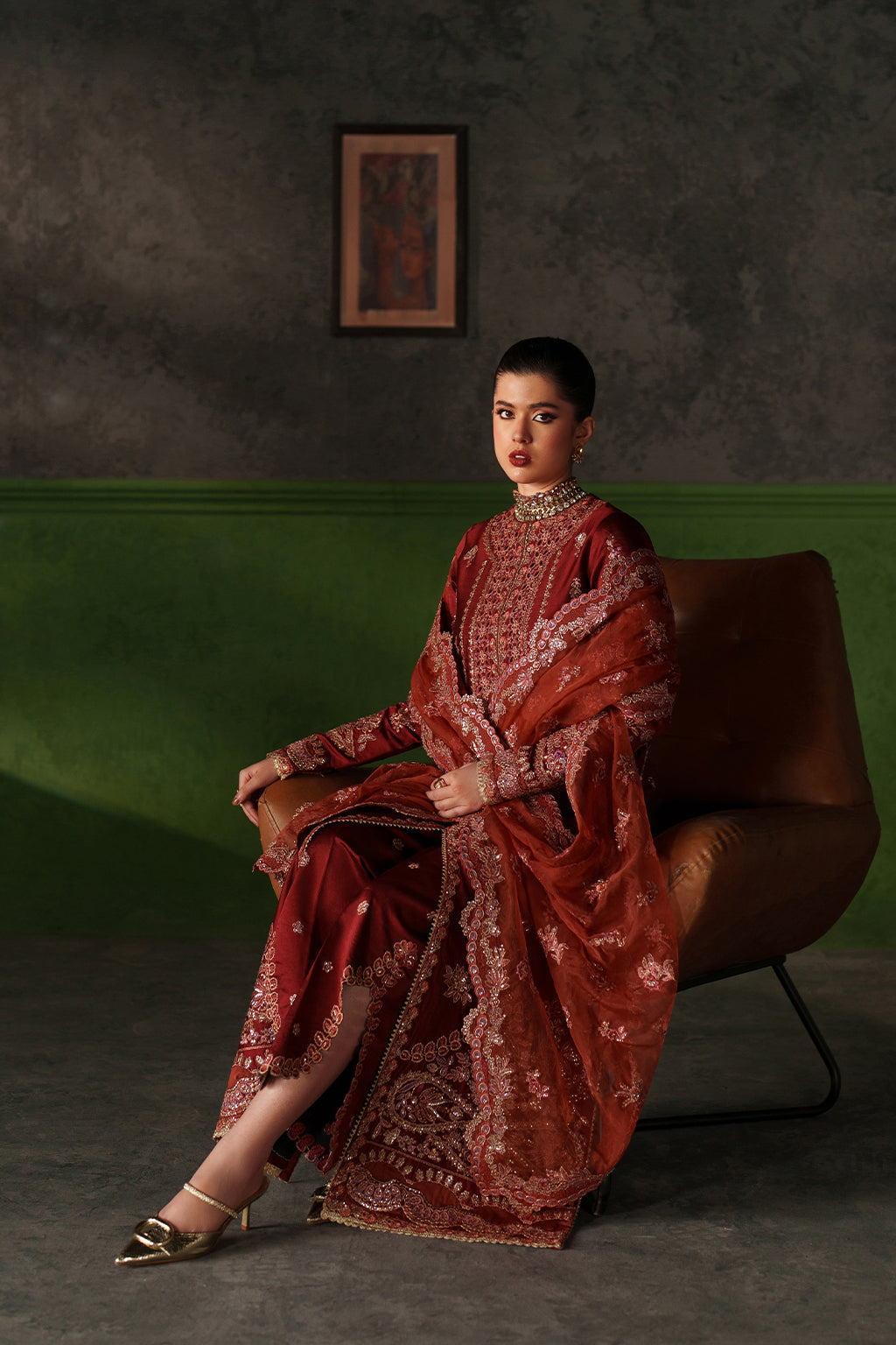Emaan Adeel Noemie S0519 embroidered raw silk suit in rust red — seated view