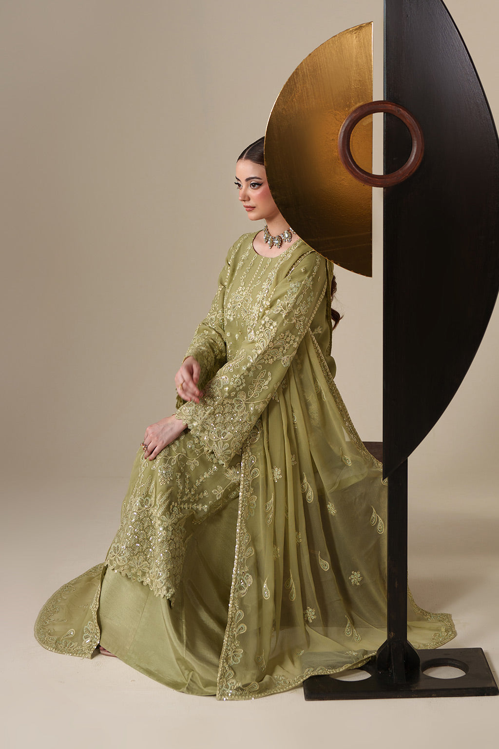 Emaan Adeel NOLA S0443 chiffon outfit in light olive green — seated view
