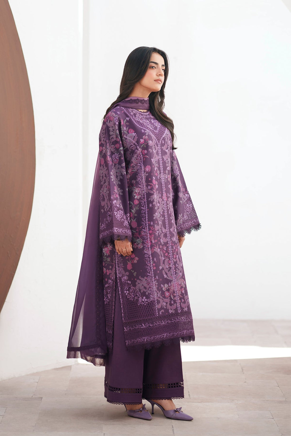 Model wearing Afrozeh Avenor purple shirt & trouser set
