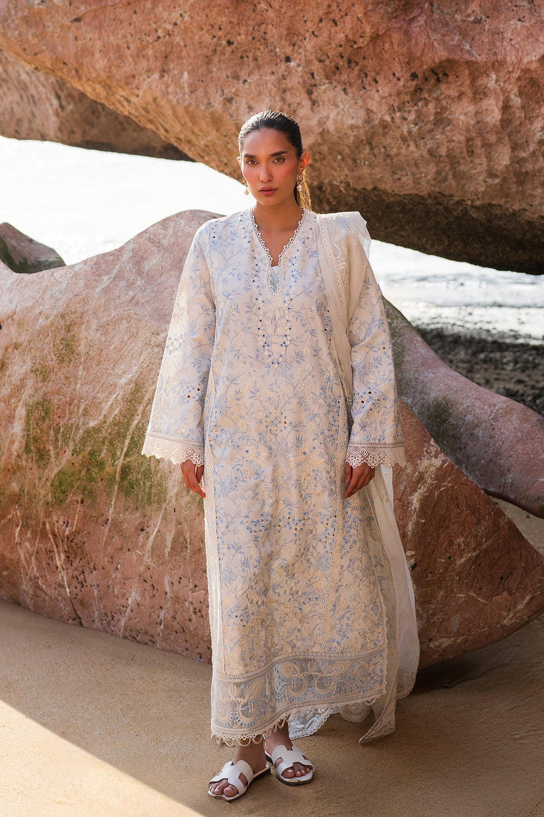 Model wearing Afrozeh Nerida white embroidered lawn suit