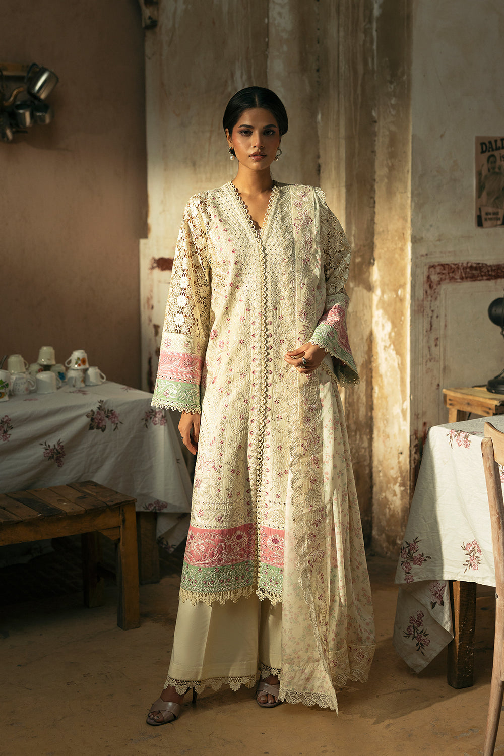 Model wearing Afrozeh Mohabbat ivory shirt & trouser set