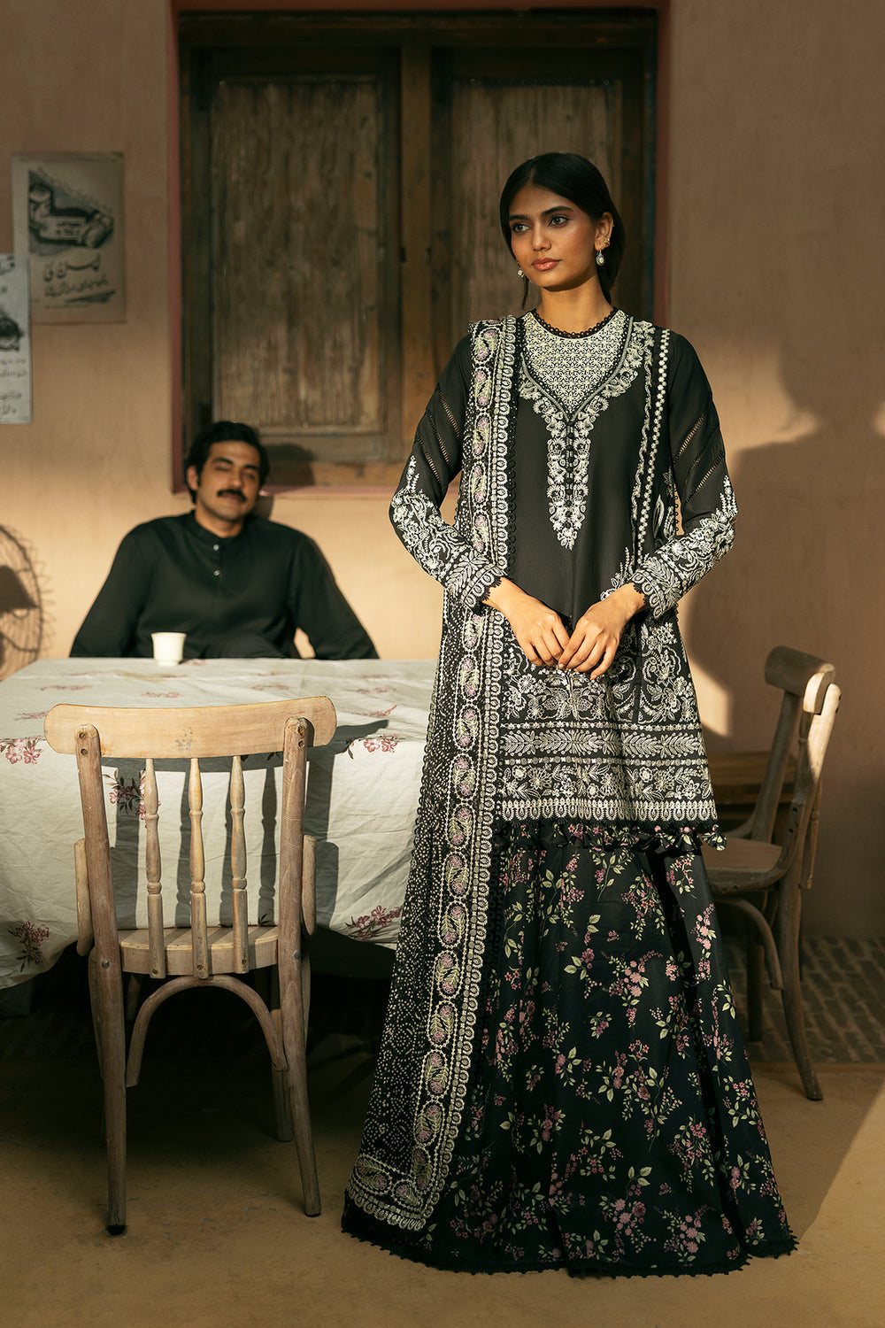 Model wearing Afrozeh Bekhudi ivory shirt & trouser set