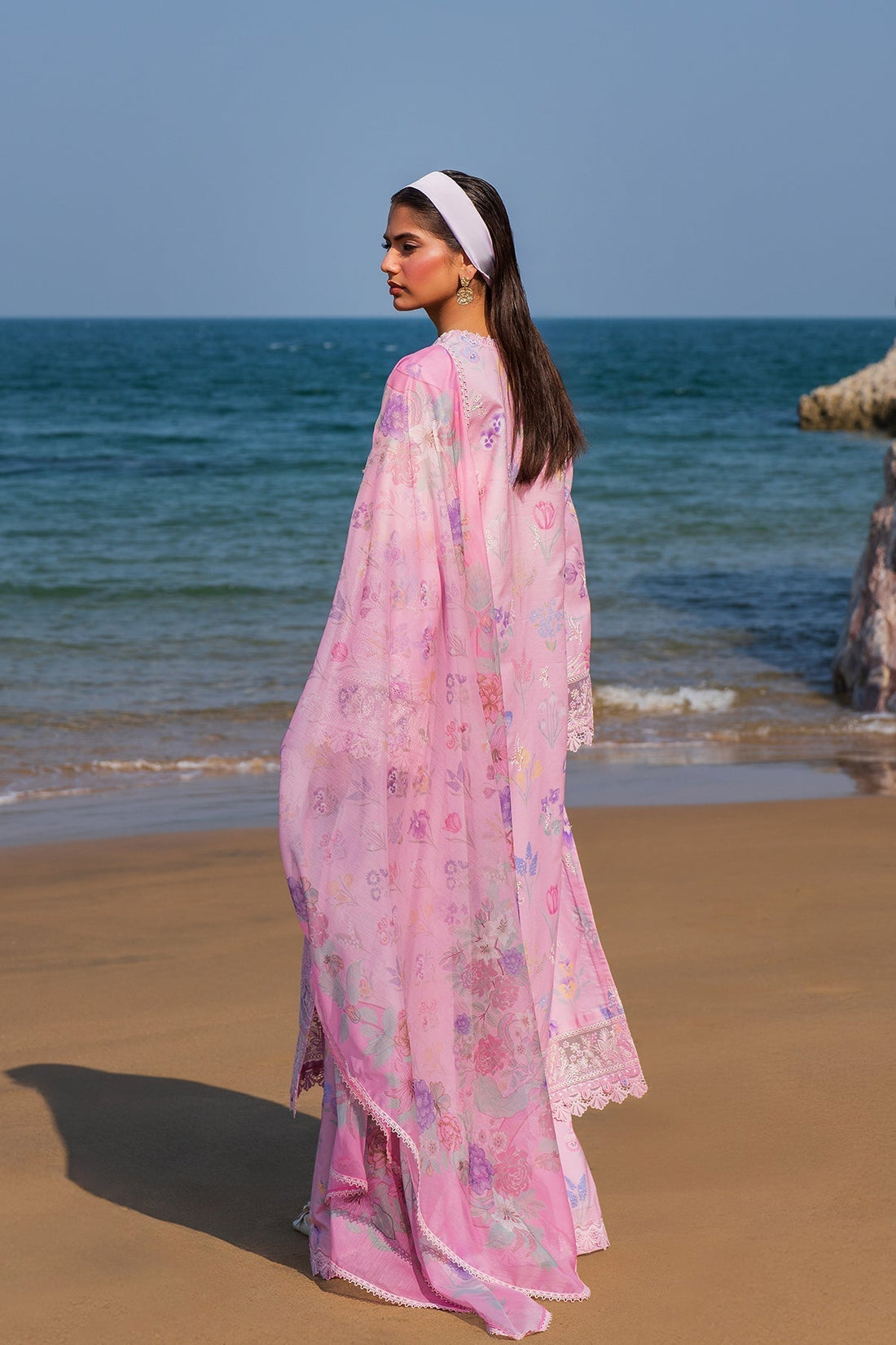 Model wearing Afrozeh Gilded pink embroidered lawn suit