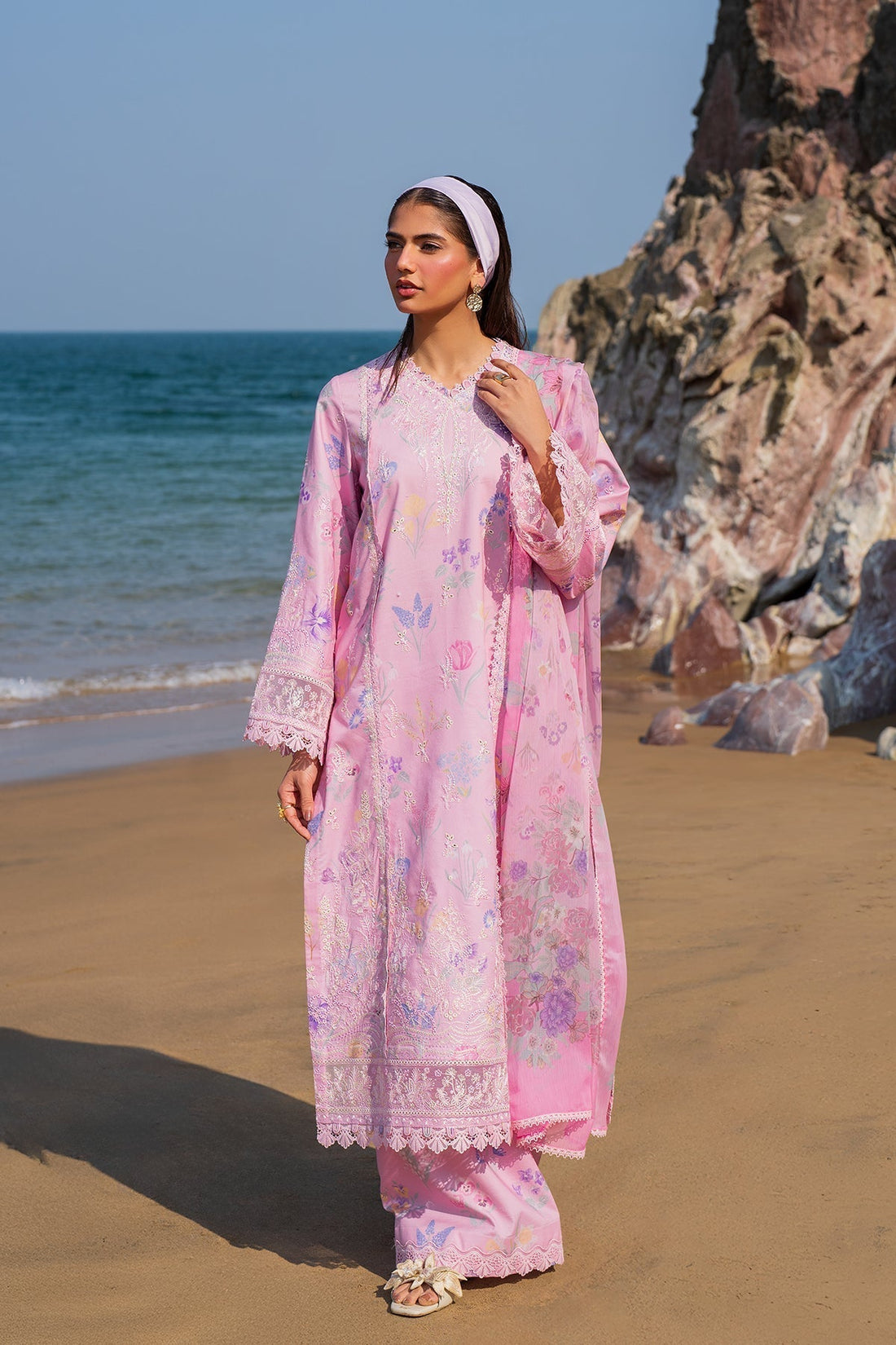 Model wearing Afrozeh Gilded pink embroidered lawn suit