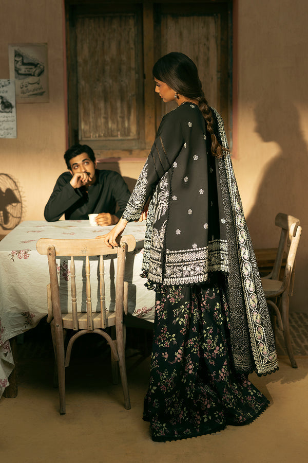 Model wearing Afrozeh Bekhudi ivory shirt & trouser set