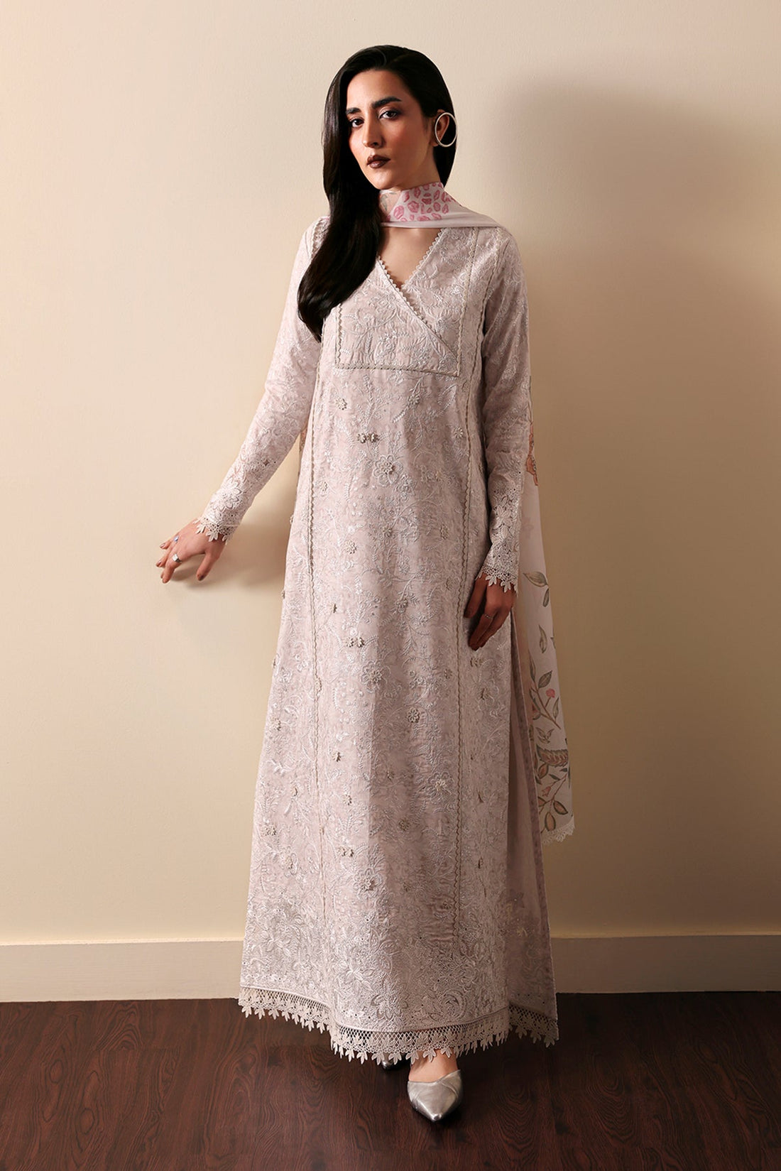 Model wearing Afrozeh Leyla embroidered lawn suit