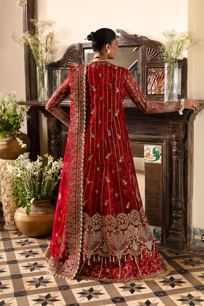 Model wearing Afrozeh Tearose maxi & lehenga