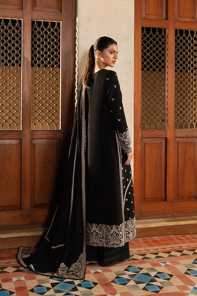 Model wearing Afrozeh Selene black long shirt & trousers