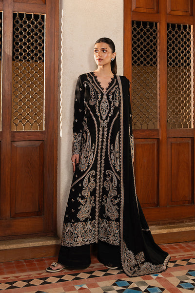Model wearing Afrozeh Selene black long shirt & trousers