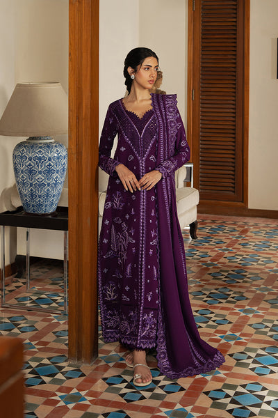 Model wearing Afrozeh Lumara plum long shirt & trousers