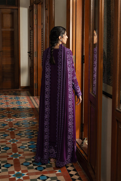 Model wearing Afrozeh Lumara plum long shirt & trousers