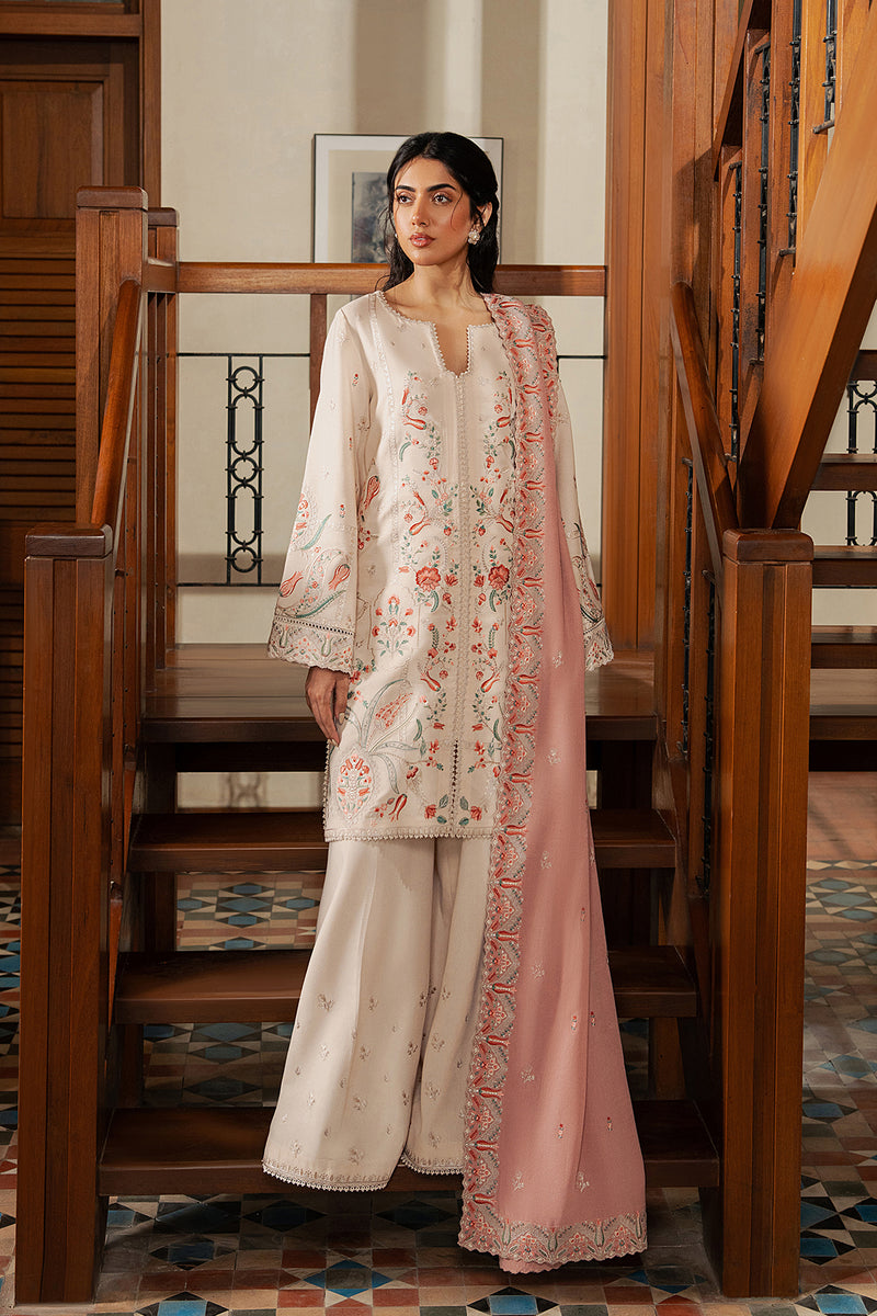 Model wearing Afrozeh Avaline ivory short shirt & trousers